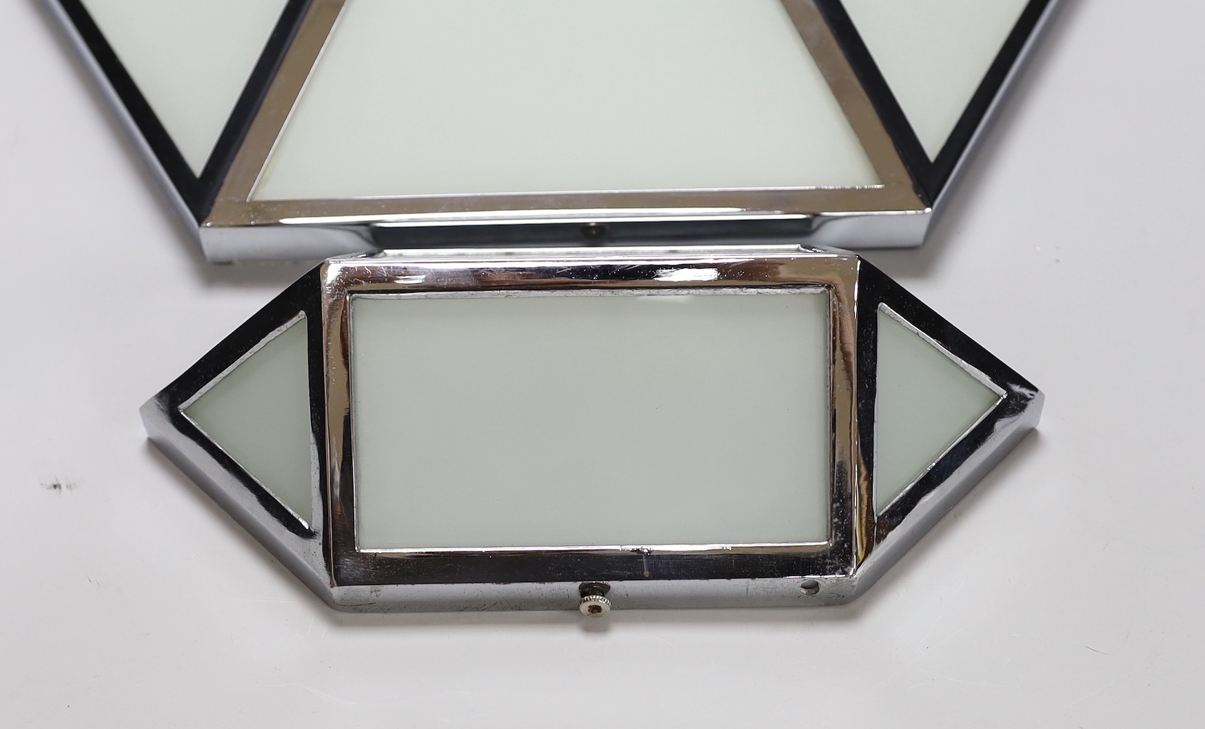 Christopher Wray. Two chrome and opaque glass light fittings